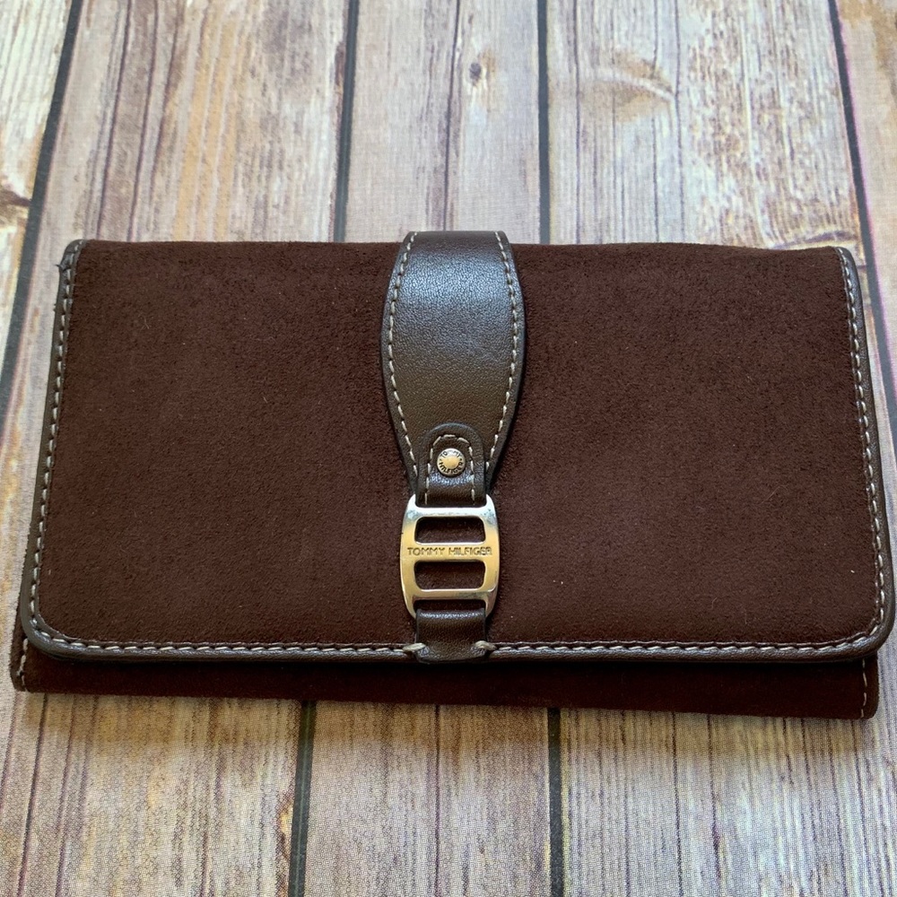 Brown Tommy Hilfiger hand wallet pocket book
